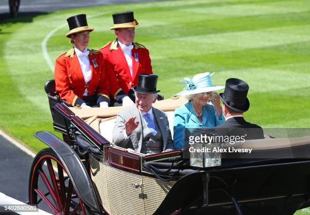 The Prince of Wales with The Duchess of Cornwall are seen in the royal procession as they enter the parade ring during Royal Ascot 2022 at Ascot...