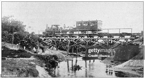 antikes foto: madagaskar, eisenbahnbrücke in pangalanes - railway bridge stock-grafiken, -clipart, -cartoons und -symbole