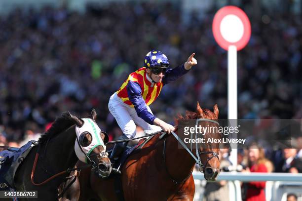 James McDonald celebrates on board Nature Strip as they win The King's Stand Stakes during Royal Ascot 2022 at Ascot Racecourse on June 14, 2022 in...