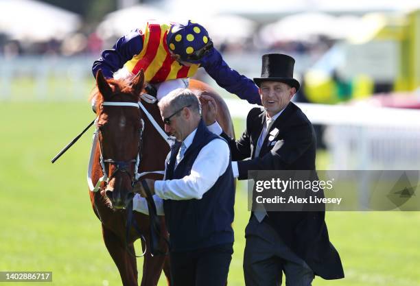 James McDonald celebrates with trainer Chris Waller on board Nature Strip as they win The King's Stand Stakes during Royal Ascot 2022 at Ascot...