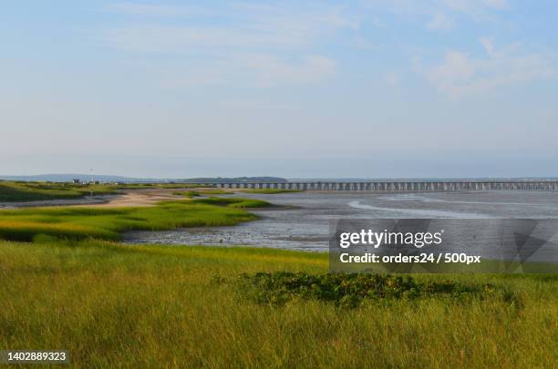 beautiful views of powder point bridge and duxbury bay - massachusetts beach stock pictures, royalty-free photos & images