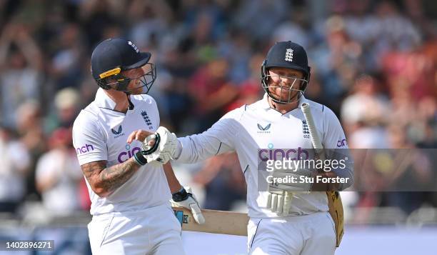 England batsman Jonny Bairstow is congratulated by Ben Stokes after getting out for 136 during day five of the Second Test Match between England and...