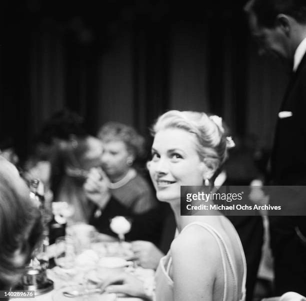 American actress Grace Kelly attends the Academy Awards at the Pantages Theatre in Hollywood, California, 30th March 1955.