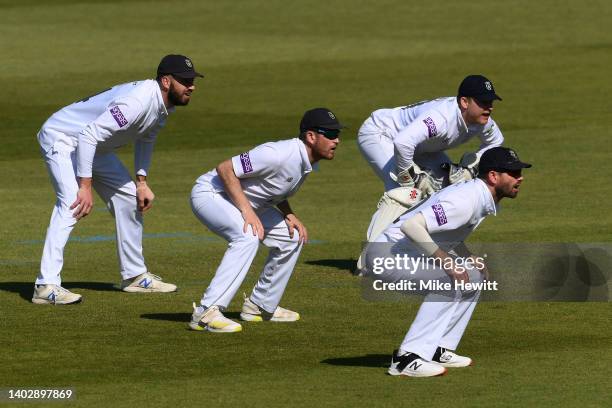 James Vince, Liam Dawson, Ben Brown and Ian Holland of Hampshire line up in the slips during the LV= Insurance County Championship match between...