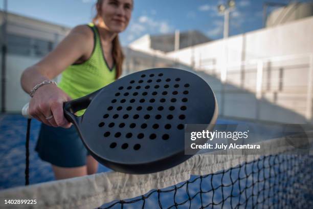 wide angle of paddle tennis player - using a paddle imagens e fotografias de stock