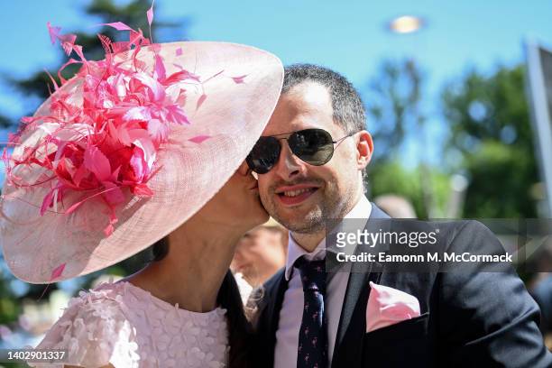 Racegoers kiss during Royal Ascot 2022 at Ascot Racecourse on June 14, 2022 in Ascot, England.
