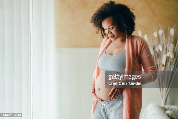 brazilian ethnicity pregnant woman - pregnant women stock pictures, royalty-free photos & images