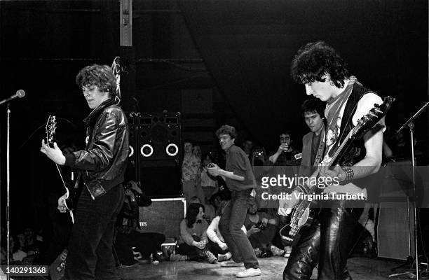 Tom Robinson from The Tom Robinson Band and Jake Burns from Stiff Little Fingers perform live on stage at the finale of the Rock Against Racism Red...