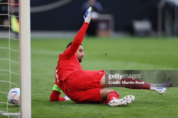 Gianluigi Donnarumma of Italy attempts to stop the ball as Joshua Kimmich of Germany scores their side's first goal during the UEFA Nations League...
