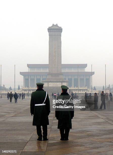 Chinese paramilitary policemen stand guard at the Tiananmen Square on March 1, 2012 in Beijing, China. The Chinese People's Political Consultative...