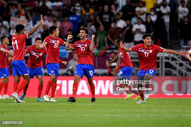 Costa Rica celebrates after defeating New Zealand in the 2022 FIFA World Cup Playoff match between Costa Rica and New Zealand at Ahmad Bin Ali...