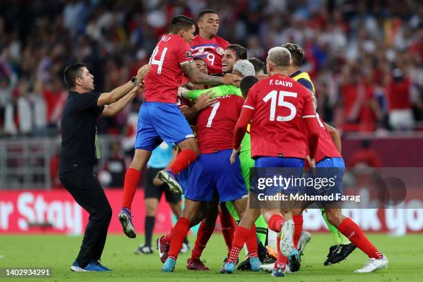 Costa Rica players celebrate after their sides victory and qualification for the 2022 FIFA World Cup during the 2022 FIFA World Cup Playoff match...