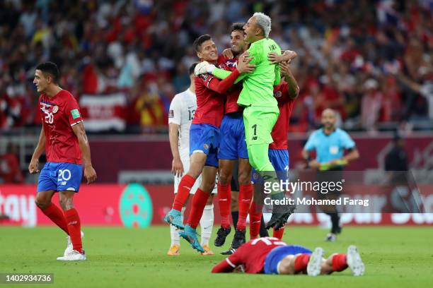 Keylor Navas of Costa Rica celebrates with teammates after their sides victory and qualification for the 2022 FIFA World Cup during the 2022 FIFA...
