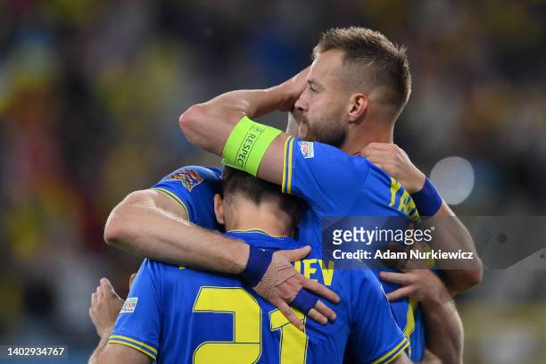 Artem Dovbyk of Ukraine celebrates scoring their side's first goal with teammates during the UEFA Nations League - League B Group 1 match between...