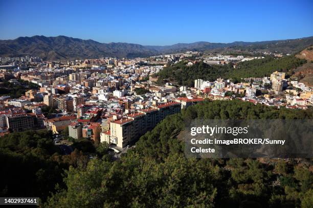 malaga, view from castillo de gibralfaro over part of the city, andalucia, spain - málaga málaga province stock illustrations