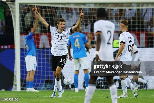 Thomas Muller of Germany celebrates after Timo Werner scores their side's fourth goal during the UEFA Nations League - League A Group 3 match between...