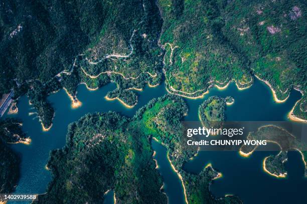 aerial view of famous tai lam chung reservoir in landscape - dam china stock pictures, royalty-free photos & images