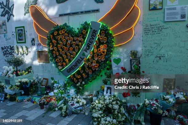 Visual tributes are left to the 72 dead at Grenfell Tower on June 14, 2022 in London, England. On 14 June 2017, just before 01:00, a fire broke out...