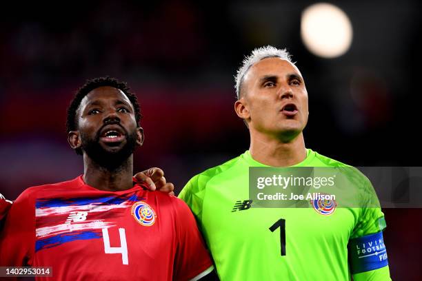 Keysher Fuller and Keylor Navas of Costa Rica sing the national anthem in the 2022 FIFA World Cup Playoff match between Costa Rica and New Zealand at...