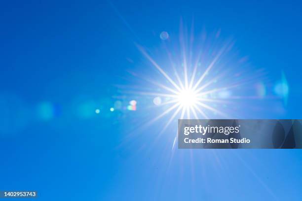 Sun In Blue 752 Blue Sky Lens Flare Stock Photos, High-Res Pictures, and Images ...