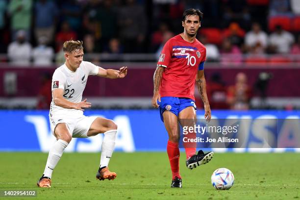 Bryan Ruiz of Costa Rica passes the ball in the 2022 FIFA World Cup Playoff match between Costa Rica and New Zealand at Ahmad Bin Ali Stadium on June...