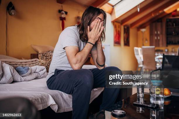 man just woke up - rubbing eyes stock pictures, royalty-free photos & images