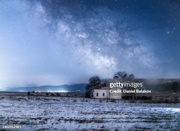 christian chapel in nature under milky way. - apologize stockfoto's en -beelden