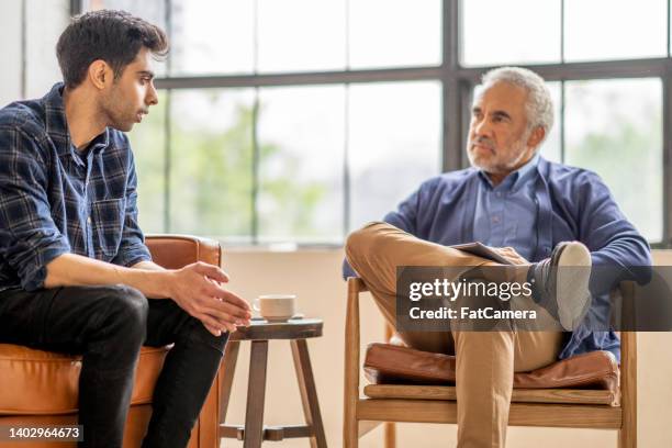 psychiatrist meeting with a patient - addiction recovery stock pictures, royalty-free photos & images