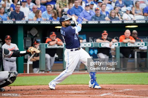 Carlos Santana of the Kansas City Royals hits against the Baltimore Orioles in the first inning at Kauffman Stadium on June 10, 2022 in Kansas City,...