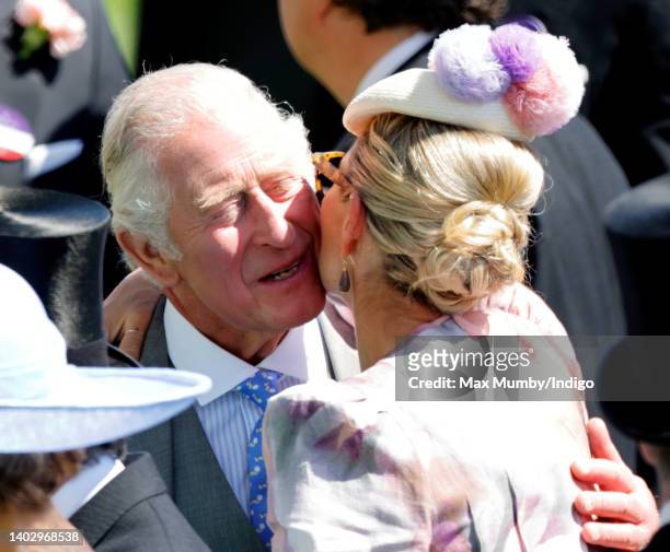 Zara Tindall kisses Prince Charles, Prince of Wales as they attend day 1 of Royal Ascot at Ascot Racecourse on June 14, 2022 in Ascot, England.