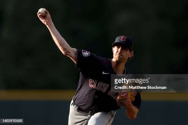 Starting pitcher Shane Bieber of the Cleveland Guardians throws against the Colorado Rockies in the first inning at Coors Field on June 14, 2022 in...