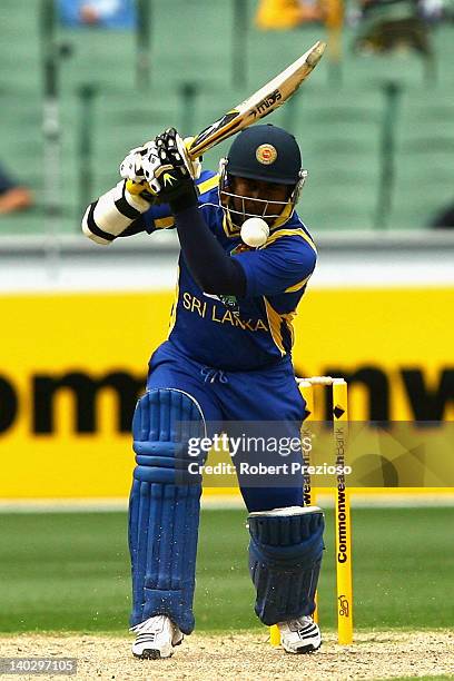 Rangana Herath of Sri Lanka plays a shot during the One Day International match between Australia and Sri Lanka at Melbourne Cricket Ground on March...