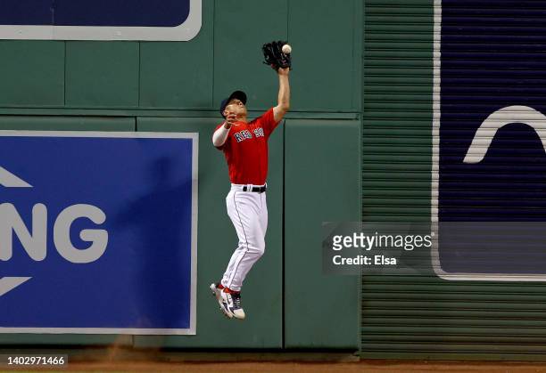 Rob Refsnyder of the Boston Red Sox catches a hit by Ramon Laureano of the Oakland Athletics in the sixth inning for the out at Fenway Park on June...
