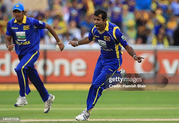 Nuwan Kulasekara of Sri Lanka celebrates after taking the wicket of Matthew Wade of Australia during the One Day International match between...