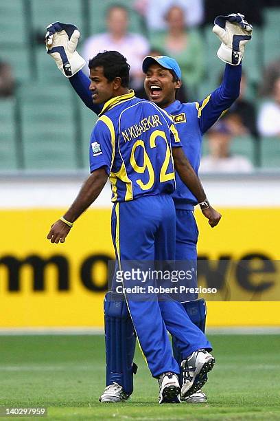 Nuwan Kulasekara of Sri Lanka celebrates the wicket of Matthew Wade of Australia during the One Day International match between Australia and Sri...