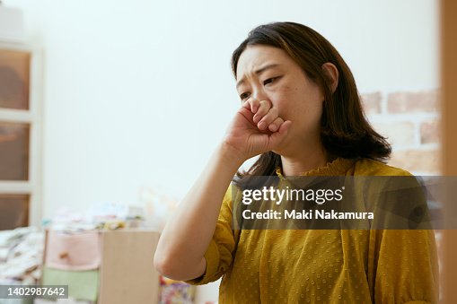 Woman drinking tea with medicinal properties due to poor health. Woman drinking tea with medicinal properties due to poor health.