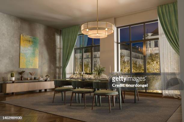 luxurious dining room interior at night with dining table, velvet chairs, chandelier and decorative objects - hanging lamp stock pictures, royalty-free photos & images