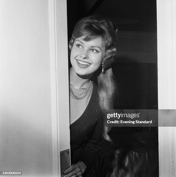 American beauty queen Michele Metrinko backstage at Miss World 1963, held at the Lyceum Ballroom in London, England, 7th November 1963. The former...