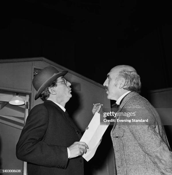 British-born Australian actor Peter Finch and British actor and film director Lionel Jeffries during filming of 'First Men in the Moon' at Shepperton...