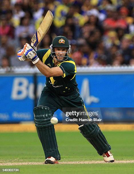 Michael Hussey of Australia drives during the One Day International match between Australia and Sri Lanka at Melbourne Cricket Ground on March 2,...