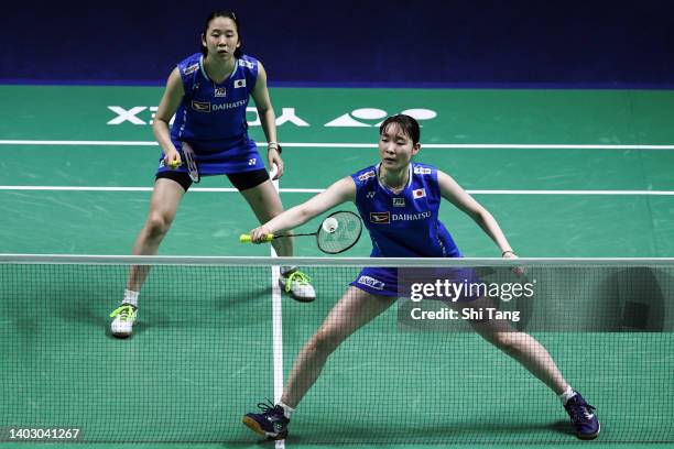 Mayu Matsumoto and Wakana Nagahara of Japan compete in the Women's Doubles First Round match against Apriyani Rahayu and Siti Fadia Silva Ramadhanti...