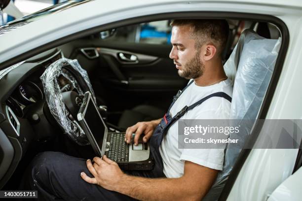 Testing Car Computer 8,803 Inspecting Car Interior Stock Photos, High-Res Pictures, and ...