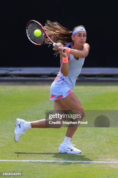 Aleksandra Krunic of Serbia plays a backhand against Sorana Cirstea of Romania during the second round match on Day Five of the Rothesay Classic...