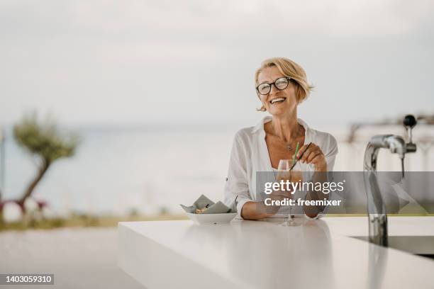 woman enjoying life - overcast portrait stock pictures, royalty-free photos & images