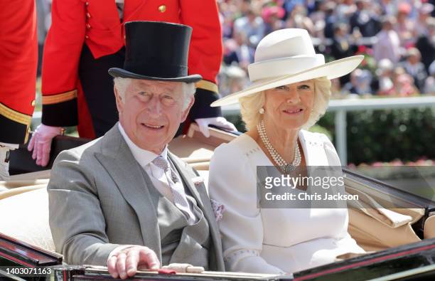 Prince Charles, Prince of Wales and Camilla, Duchess of Cornwall arrive into the parade ring on the royal carriage as they attend Royal Ascot 2022 at...