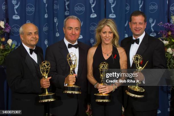 Emmy Winners : Ken Aymong, Lorne Michaels, Marci Klein and MIchael Shoemaker celebrate Emmy for "SNL: 25th Anniversary Special", backstage at the...