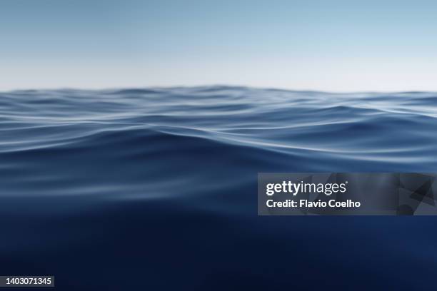 calm ocean water - water surface stock-fotos und bilder