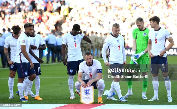 Harry Kane of England waits for his team mates before a team photograph before the UEFA Nations League League A Group 3 match between England and...