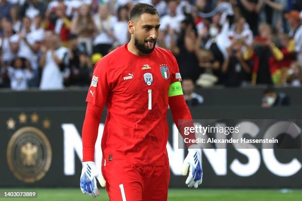 Gianluigi Donnarumma of Italy reacts after likay Gundogan of Germany scores their side's second goal from a penalty during the UEFA Nations League -...