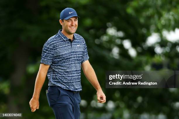 Scottie Scheffler of the United States smiles on the 12th hole during a practice round prior to the 122nd U.S. Open Championship at The Country Club...